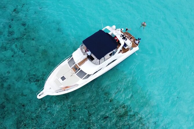 4 hours snorkel & beach tour - Private Yacht 47 ft - Snorkeling, paddleboarding, and fishing from the yacht