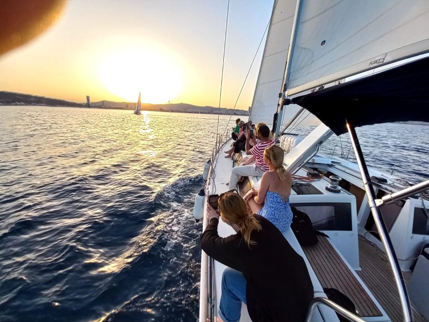 Barcelona: Luxury Private Sunset Yacht Cruise - Leaving the port with cava and local snacks