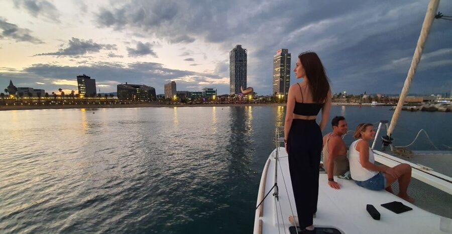 Barcelona: Luxury Private Sunset Yacht Cruise - The sunset and Barcelona skyline