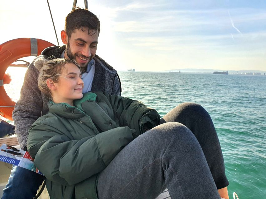 Barcelona: Luxury Private Yacht Daytime Cruise - Drinks, snacks, blankets, and onboard atmosphere