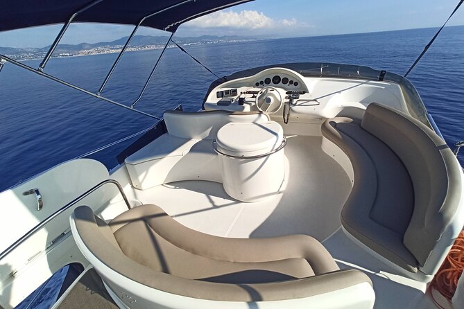 Barcelona Private Luxury Yacht Tour - A swim stop with towels and paddleboard