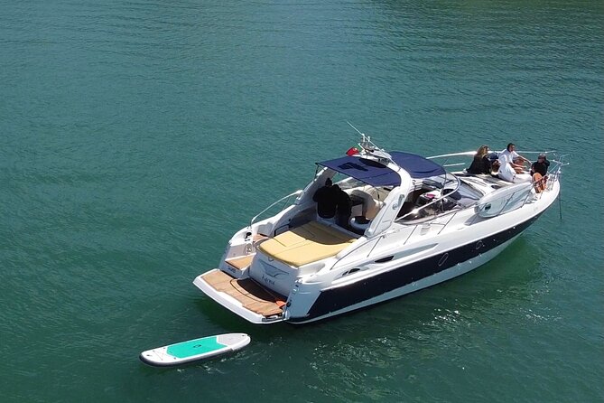 Benagil private yacht from lagos with drinks, tapas, paddle boards and kayak - From Lagos Marina toward Benagil