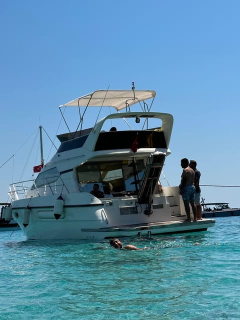 Bodrum: Private Sunset Yacht Tour with light Dinner - Akvaryum Koyu: a 30-minute swim stop