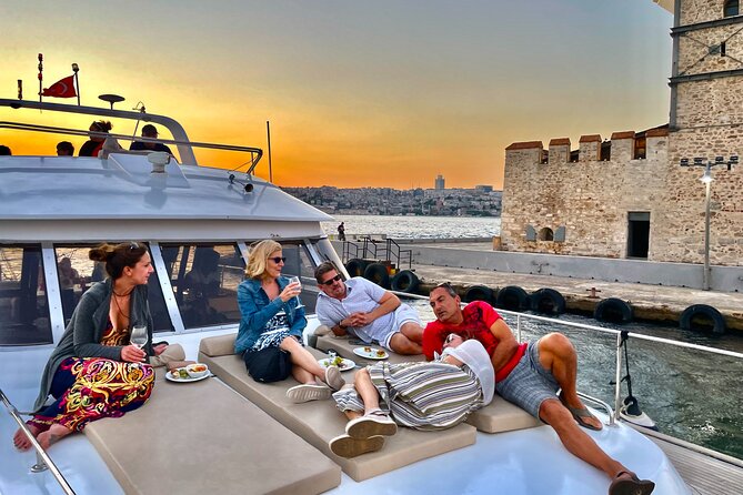 Bosphorus Sunset or Daytime Yacht Cruise with Snacks & Live Guide - Maiden’s Tower and Galata Tower from the water