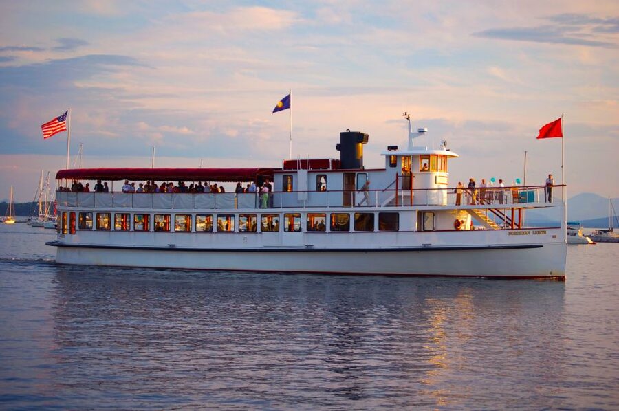 Boston: Harbor Sunset Yacht Cruise - The USS Constitution cannon salute at sunset
