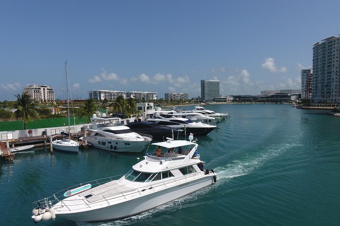Cancun Boat Tour to Isla Mujeres on Luxury Yacht with Chef -SR55C - Choosing the day’s route around Isla Mujeres