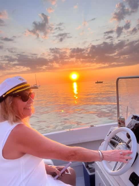 Cefalù: Mini Yacht Tour with Caves, Snorkeling, and Open Bar Aperitif - Cefalù’s pier and boardwalk from offshore