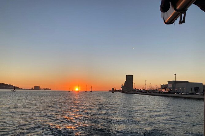 Classic Yacht Experience in Lisbon with portuguese wine - The Discoveries Monument from the water
