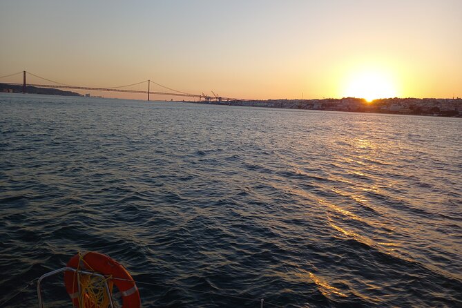 Classic Yacht Experience in Lisbon with portuguese wine - Belém Tower and the open river