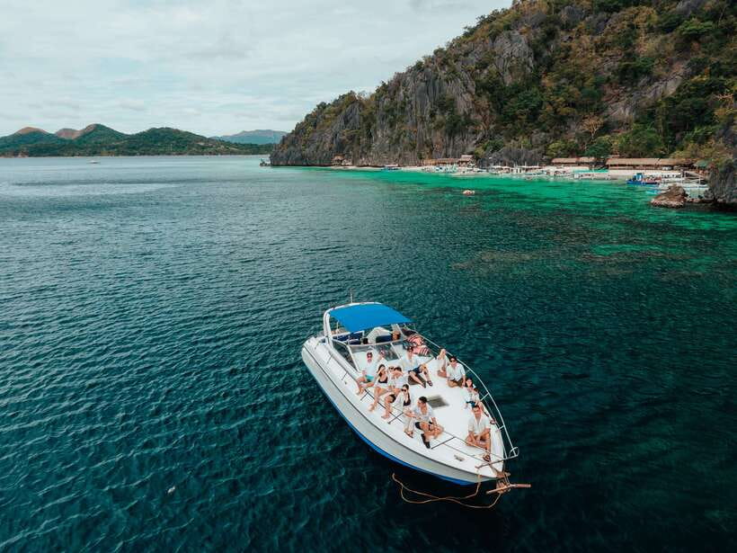 Coron: Private Island-Hopping Tour on a Yacht or Speedboat - Setting out from Coron Harbor Square