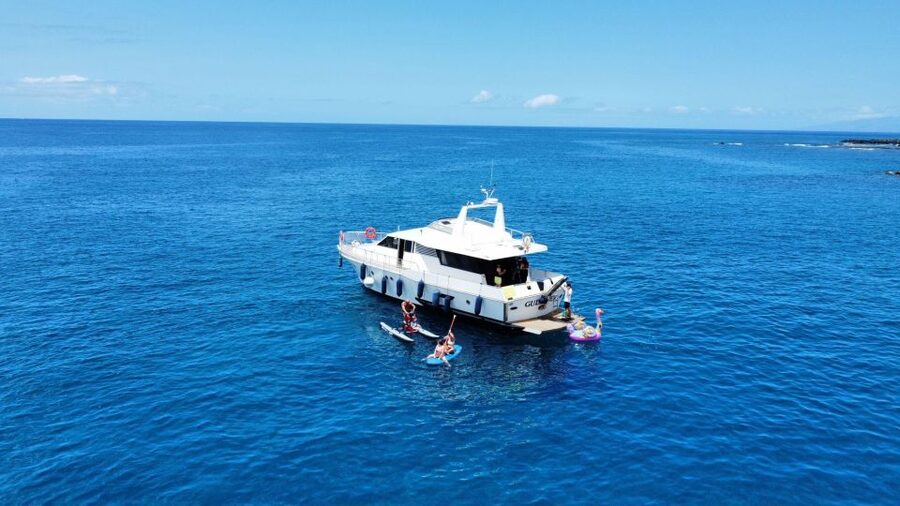 Costa Adeje: Private Yacht Trip with Watersports and Slides - Playa de las Vistas and the water-play session