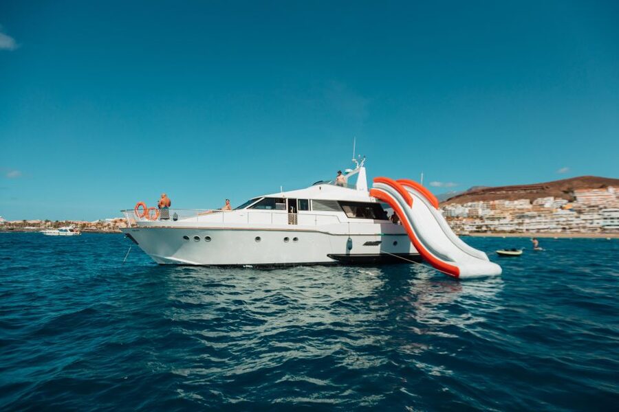 Costa Adeje: Private Yacht Trip with Watersports and Slides - Lunch, snacks, and the open drink menu