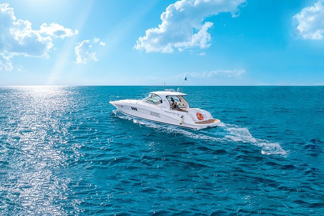 Cozumel Private Yacht and Snorkel with Lunch and Open Bar Onboard - Snorkeling in Cozumel’s clear water