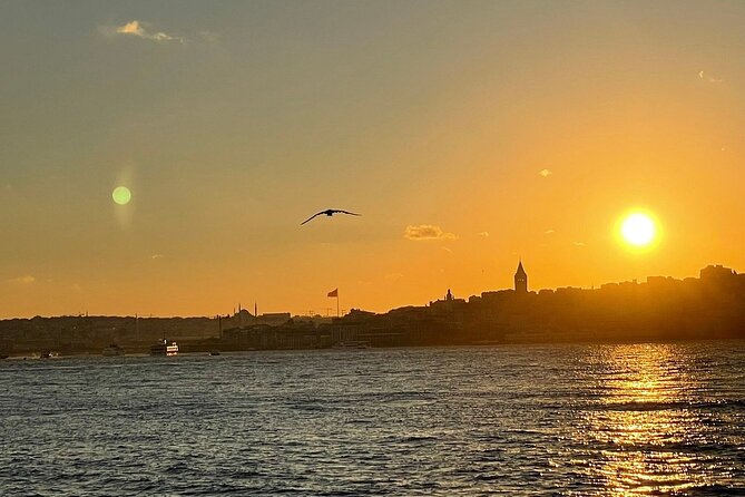 Dolmabahçe Palace Tour with Guide and Luxury Yacht Sunset Cruises - Galata Tower and the Maiden’s Tower at sunset