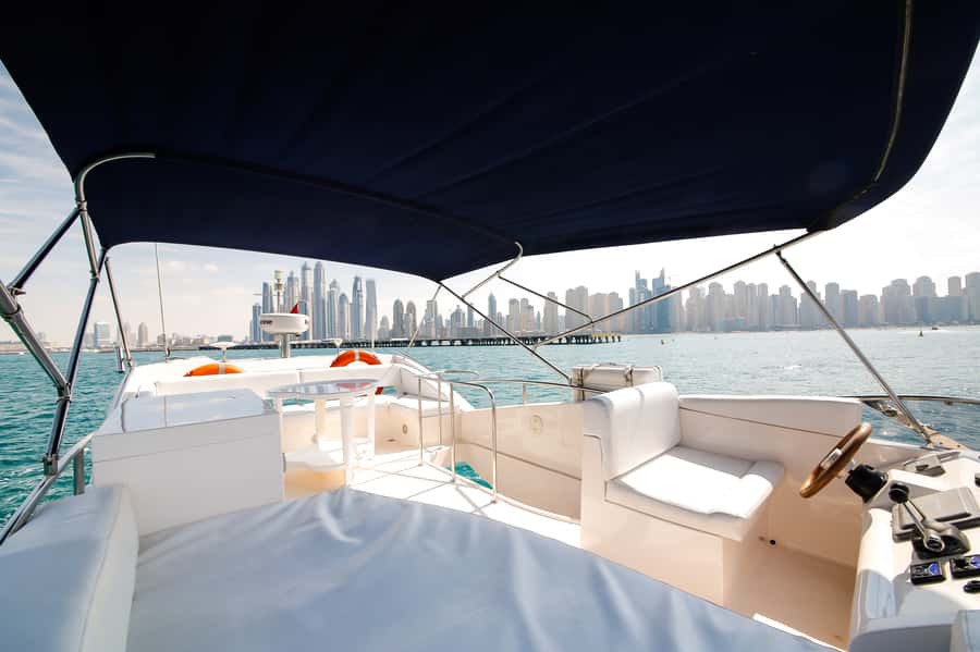 Dubai: Atlantis and Burj Al Arab Cruise on Luxury Yacht - Leaving the marina past Jumeirah Beach Residence