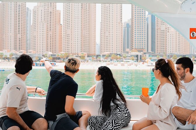 Dubai Harbour Luxury Yacht Tour with BBQ & Drinks - Skydive Dubai and the jumpers overhead