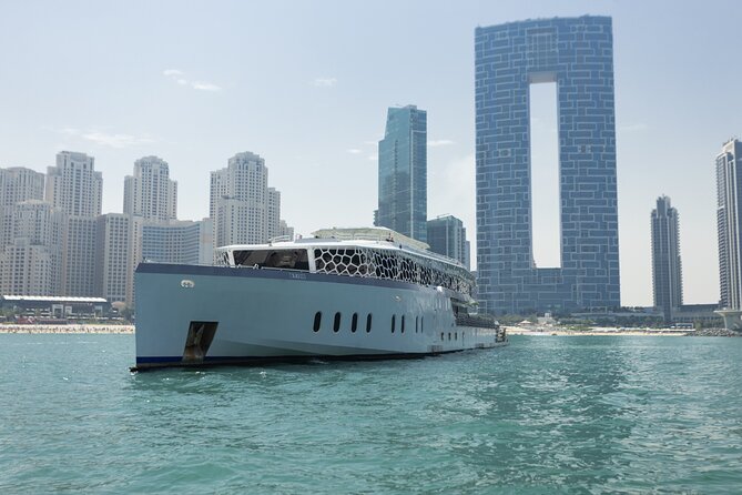 Dubai: Lotus Mega Yacht 3-Hours Dinner Cruise Tour - Bluewaters Island and Ain Dubai after dark