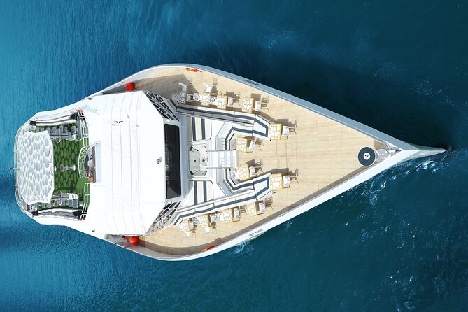 Dubai: Lotus Mega Yacht 3-Hours Dinner Cruise Tour - Live cooking, music, and entertainment zones