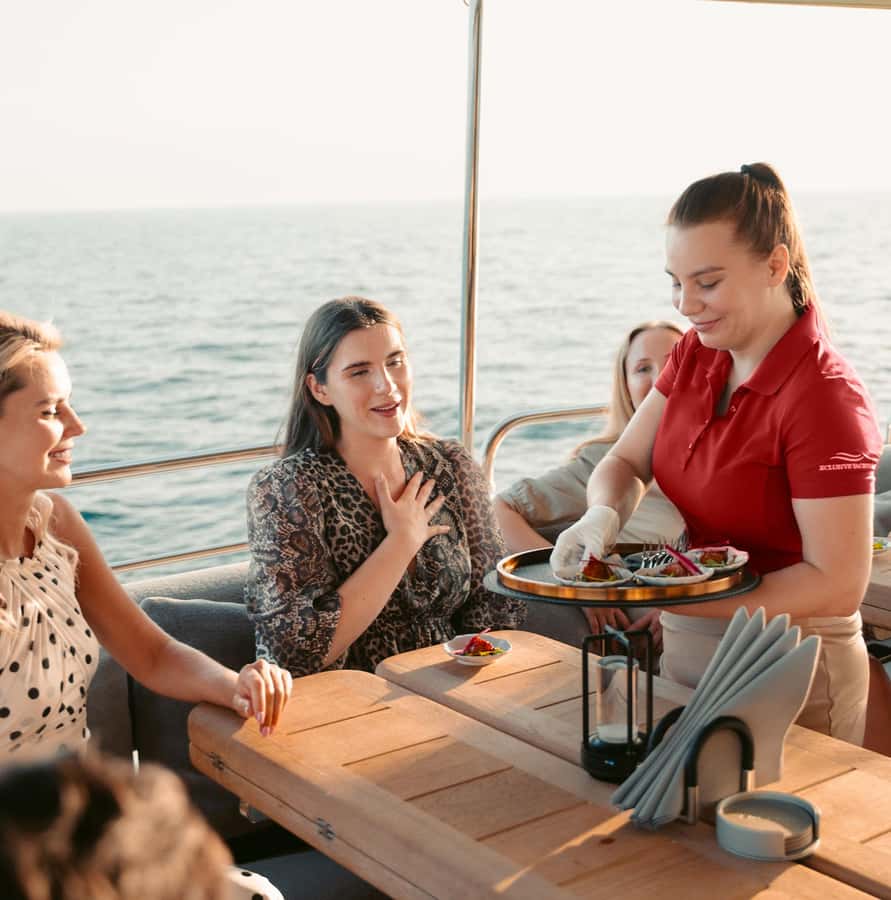 Dubai Marina: Luxury Yacht Tour with Breakfast or BBQ Option - The yacht, seating, and onboard comfort