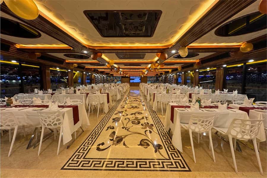 Dubai: Mega Yacht Dinner Cruise with Buffet - Tanoura dancing, aerial acts, and DJ music