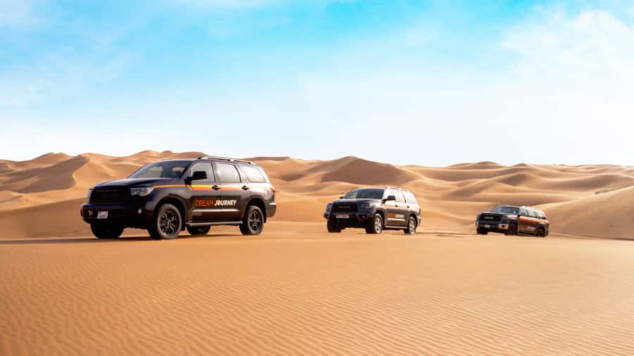 Dubai Waves & Dunes: Luxury Yacht Cruise w/ Red Dunes Safari - From your Dubai hotel to Lahbab’s red dunes