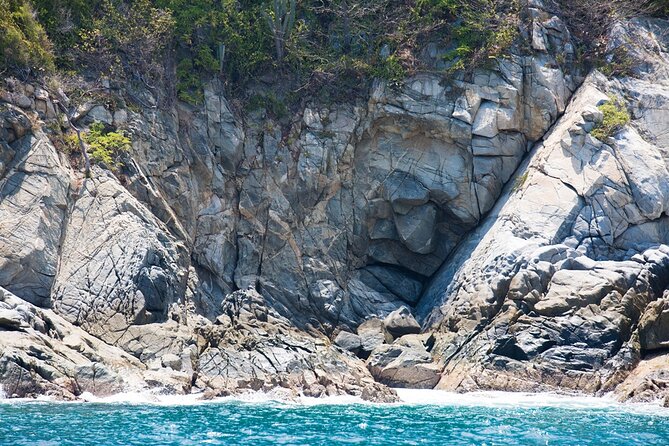 Exclusive 7 bays of Huatulco by Panga Boat or Yacht. - Cacaluta Bay, film scenery, and a heart-shaped view