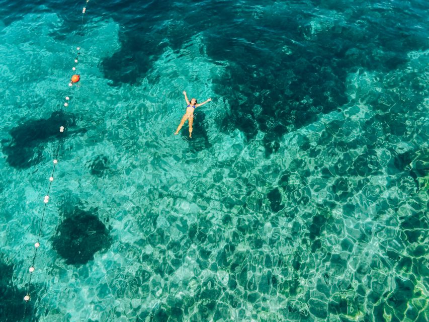 From Hvar: Boat Tour to Pakleni Islands on a Comfort Yacht - The second bay: more time to swim, paddle, or sunbathe