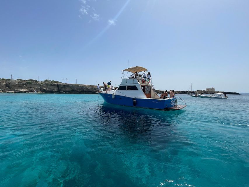 From Trapani: Favignana and Levanzo Yacht Tour with Stops - Lunch with Favignana outside the window