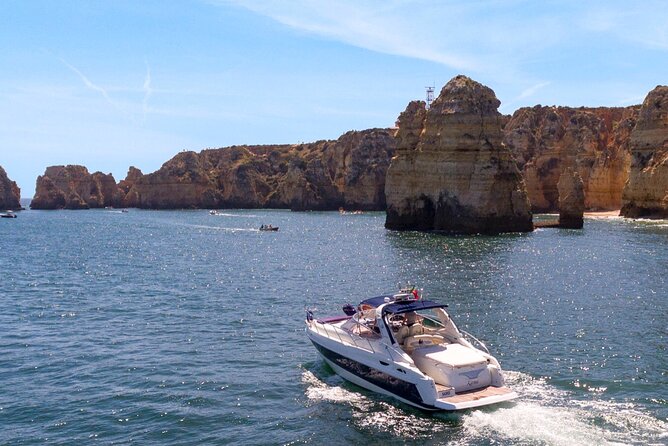 Full day private yacht from lagos with drinks, tapas, paddle boards and kayak - Choosing between Benagil and Sagres