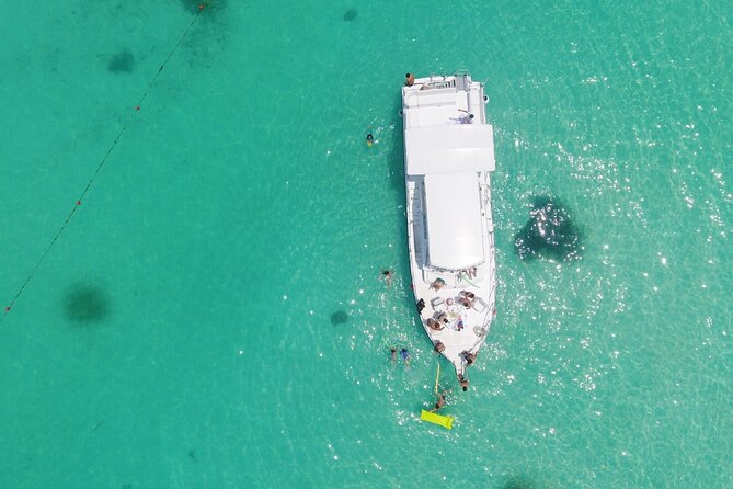 Isla Mujeres Full Day Tour on Yacht with Snorkel and Buffet - Through the mangroves and beneath Calinda Bridge