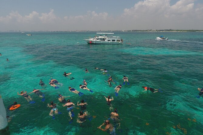 Isla Mujeres Full Day Tour on Yacht with Snorkel and Buffet - Punta Norte, Playa Norte, and a taste of downtown