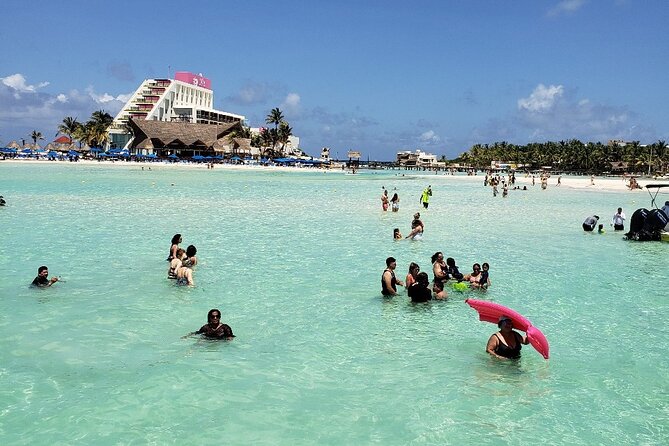 Isla Mujeres Full Day Tour on Yacht with Snorkel and Buffet - Music, games, and the sunset ride back