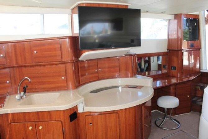 Isla Mujeres snorkeling tour on Exclusive 46ft Yacht in Cancun - Crew service, food, and drinks