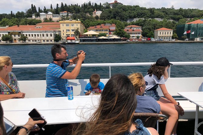 Istanbul Afternoon Bosphorus Cruise with Asian Side Stop - Crossing beneath the Bosphorus Bridge