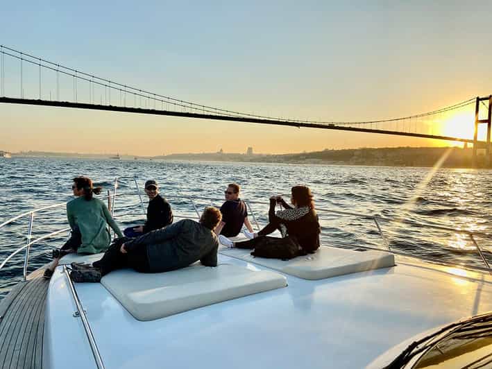 Istanbul: Bosphorus Yacht Cruise at Sunset with Snacks - Boarding the yacht and finding a good seat