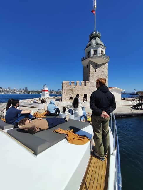 Istanbul: Morning Bosphorus Yacht Cruise w/Turkish Breakfast - Galata Bridge, Galata Tower, and Galataport from the water