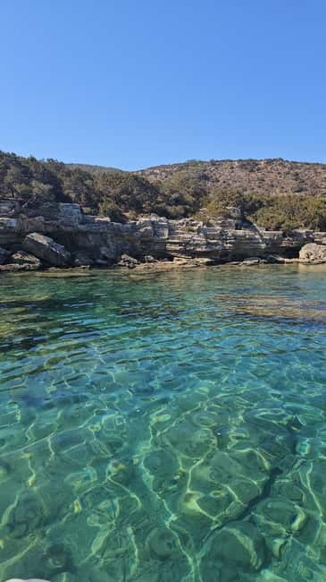 Latsi Blue Lagoon: Private Yacht with Drinks - Drinks, fruit, towels, and onboard comfort