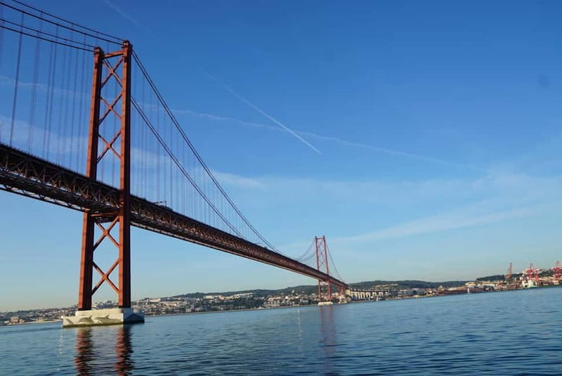 Lisbon: Classic Yacht Tour with Drinks and Pastel de Nata - Commerce Square and the eastern riverfront