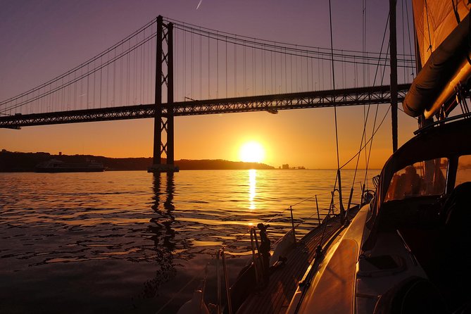 Lisbon Sunset Sailing Tour on Luxury Sailing Yacht with 2 Drinks - Booking details and weather concerns