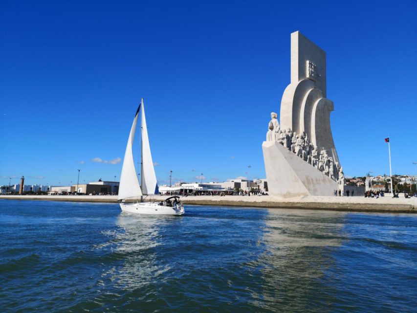 Lisbon: Yacht Sailing Tour With Portuguese Wine and History - Under the 25 de Abril Bridge