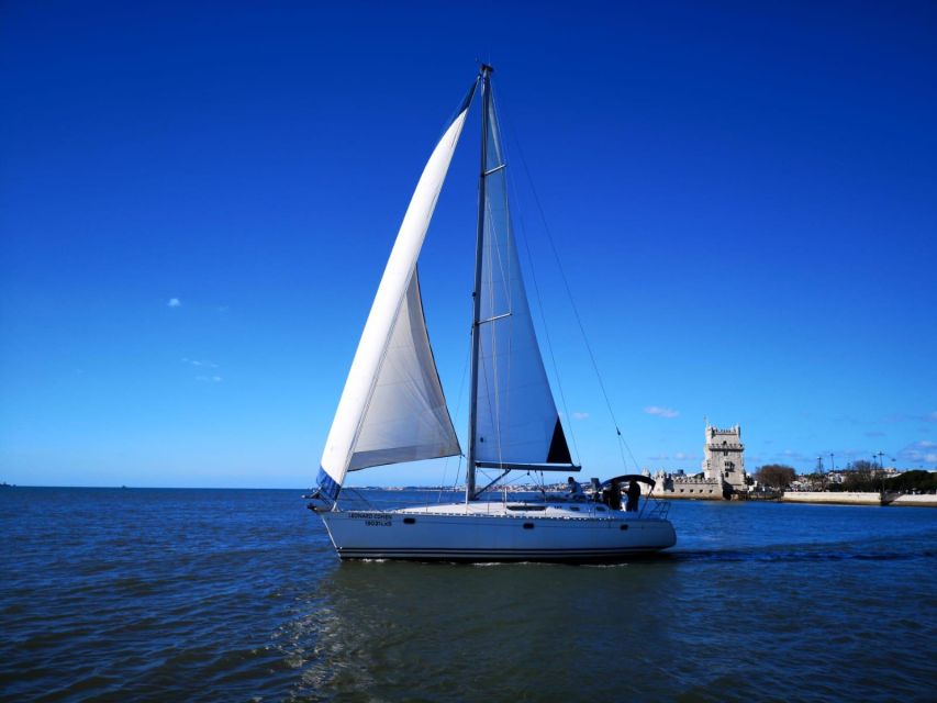 Lisbon: Yacht Sailing Tour With Portuguese Wine and History - Sailing past Belém’s monuments