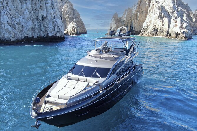 Luxury Black Yacht in Cabo - Medano Beach: drinks, food, and a final view
