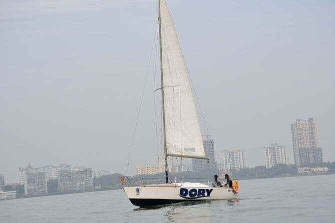 Mumbai Bay Breeze Sail on a Compact Yacht Experience - Sunset, Ships, and Offshore Views