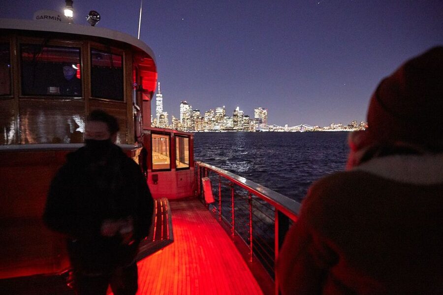 NYC: City Lights Yacht Cruise with Drink Included - The yacht, salon, and outdoor decks