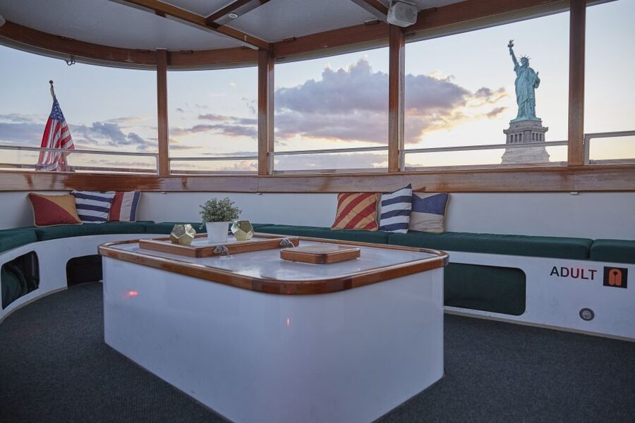 NYC: Sunset Cruise on a Small Yacht with a Drink - The Statue of Liberty at the best moment