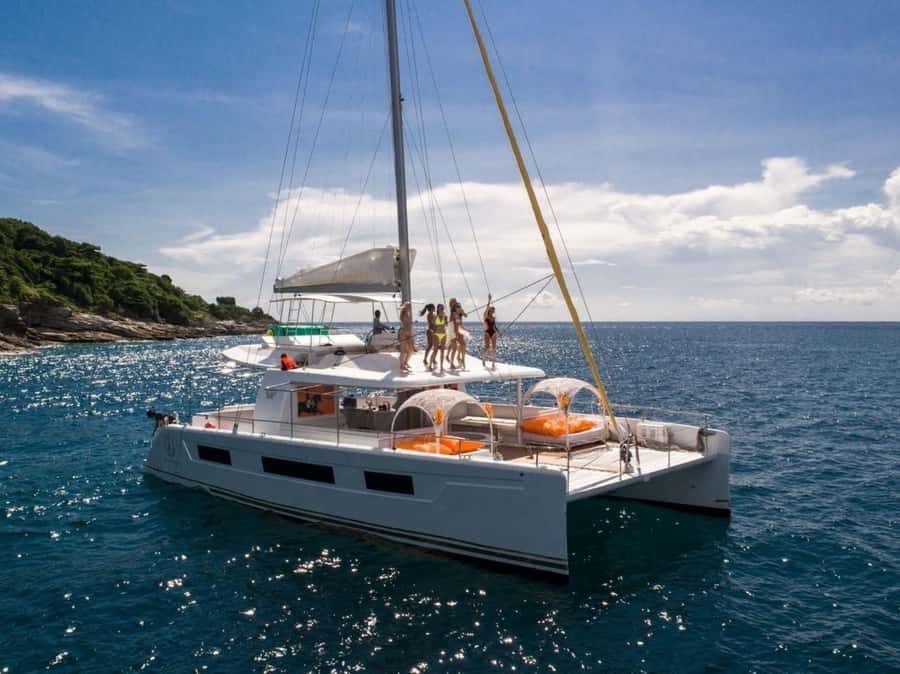 Phuket: Coral and Racha Island Yacht Tour with Lunch - Starting the day with a hotel pickup and pier briefing