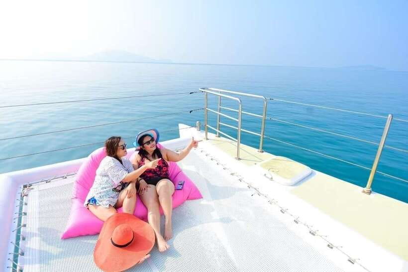 Phuket: Coral Yacht Boat Tour to Coral Island with Sunset - Raya Island combines lunch with another reef stop
