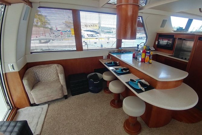 Playa Mujeres rent a Yacht 4hrs with Food and drinks aboard CA55 - Playa Norte gives you the best beach time