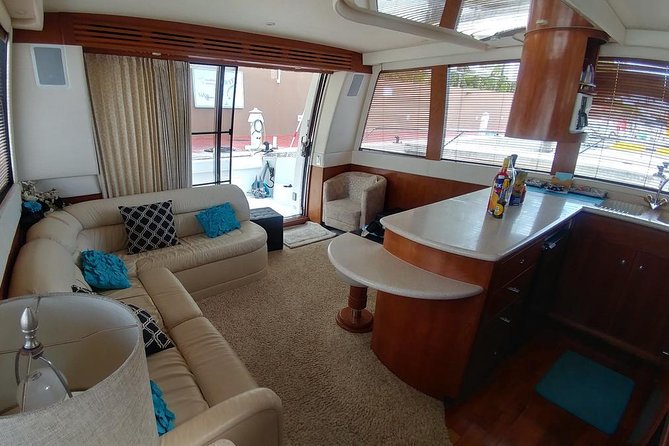 Playa Mujeres rent a Yacht 4hrs with Food and drinks aboard CA55 - Cruising the Cancun coastline for 30 minutes