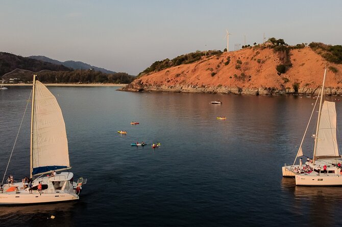 Private Catamaran Yacht to Maiton and Coral with sunset cruise - The long return toward Promthep Cape